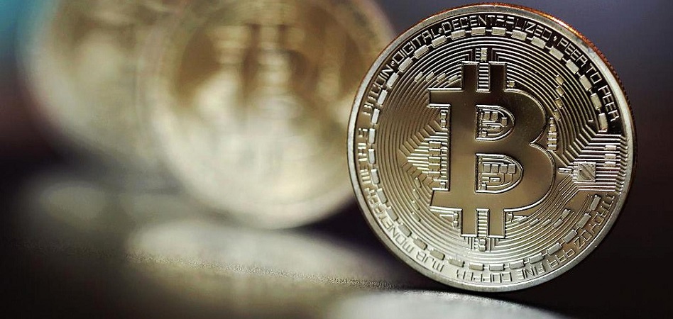El bitcoin, por la puerta grande: la criptomoneda se estrena al alza en el mercado de futuros de Chicago